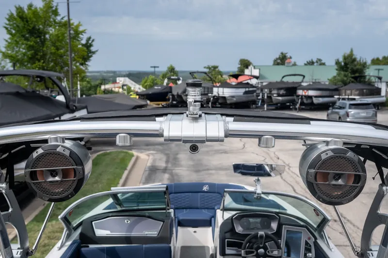 Slide: The Image of 2021 MasterCraft X24 boat interior with speakers and dashboard view. - 57