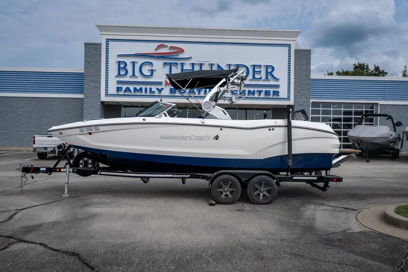 Slide: The Image of 2021 MasterCraft X24 boat on trailer at Big Thunder Family Boating Center. - 7