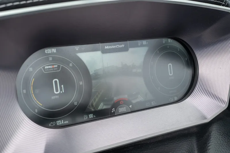 Slide: The Image of 2021 MasterCraft X24 dashboard display showing speed and RPM gauges. - 29