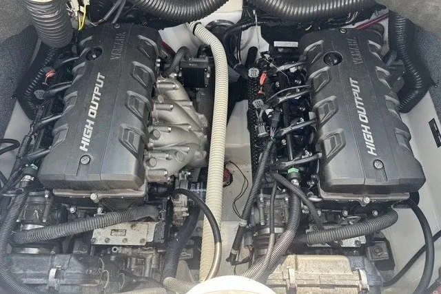 Slide: The Image of Two high-output engines inside a 2015 Yamaha 242 Limited S boat. - 9