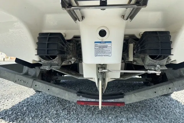 Slide: The Image of Rear view of 2015 Yamaha Boats 242 Limited S, showcasing dual jet propulsion system. - 8