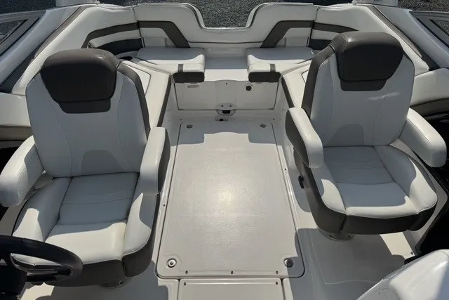 Slide: The Image of 2015 Yamaha Boats 242 Limited S interior with dual captain's chairs and spacious seating. - 5