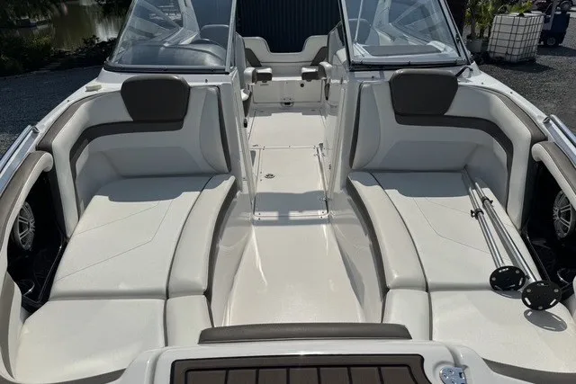 Slide: The Image of 2015 Yamaha Boats 242 Limited S interior with spacious seating and sleek design. - 4
