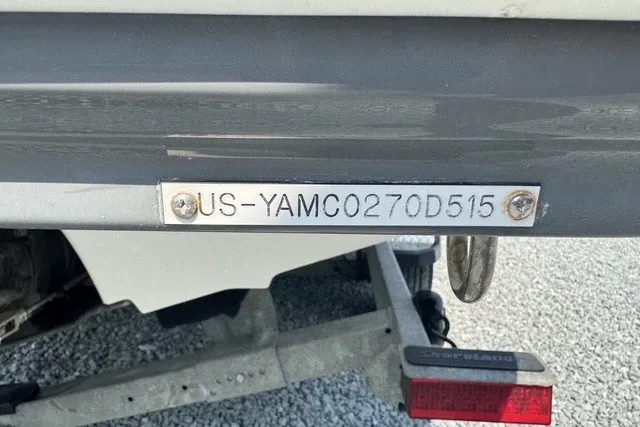 Slide: The Image of 2015 Yamaha Boats 242 Limited S hull identification number on a trailer. - 13