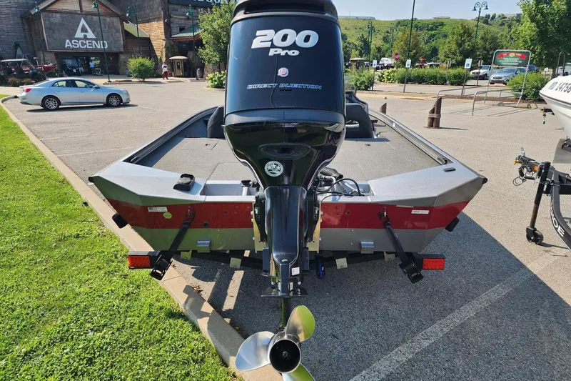 Slide: The Image of 2018 Crestliner PT 20 boat with 200 Pro motor in parking lot. - 5