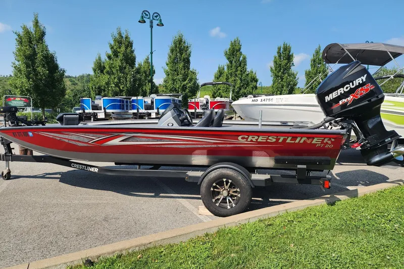 Slide: The Image of 2018 Crestliner PT 20 boat with Mercury Pro XS engine on trailer. - 1
