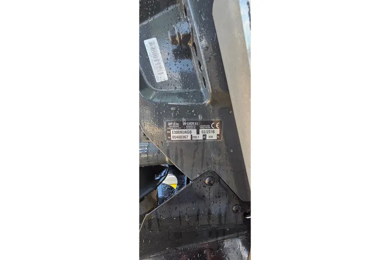 Slide: The Image of Close-up of a 2016 Ranger 2510 Bay Ranger boat engine label with serial details. - 55