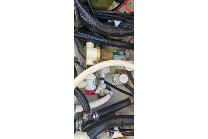 Slide: The Image of Engine compartment of 2016 Ranger 2510 Bay Ranger with hoses and fittings. - 20