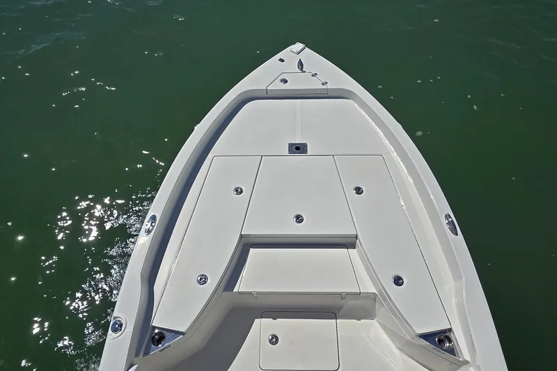 Slide: The Image of 2016 Ranger 2510 Bay Ranger boat deck on calm water. - 41