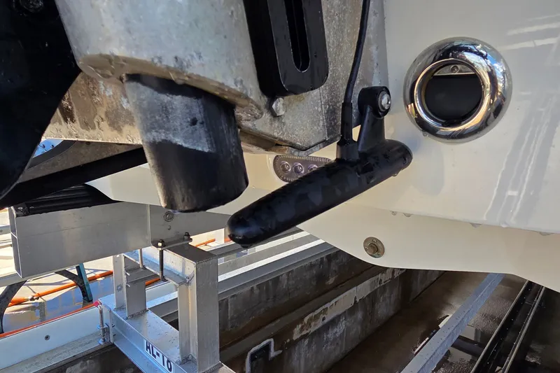 Slide: The Image of 2016 Ranger 2510 Bay Ranger boat detail showing transom and fittings. - 59