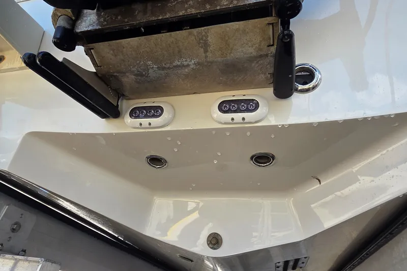 Slide: The Image of 2016 Ranger 2510 Bay Ranger boat transom with underwater lights and fittings. - 58