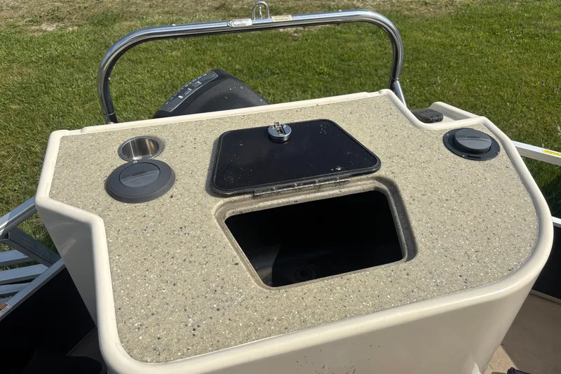 Slide: The Image of AquaPatio AP250W6 2011 boat console with storage compartment and cup holders. - 11