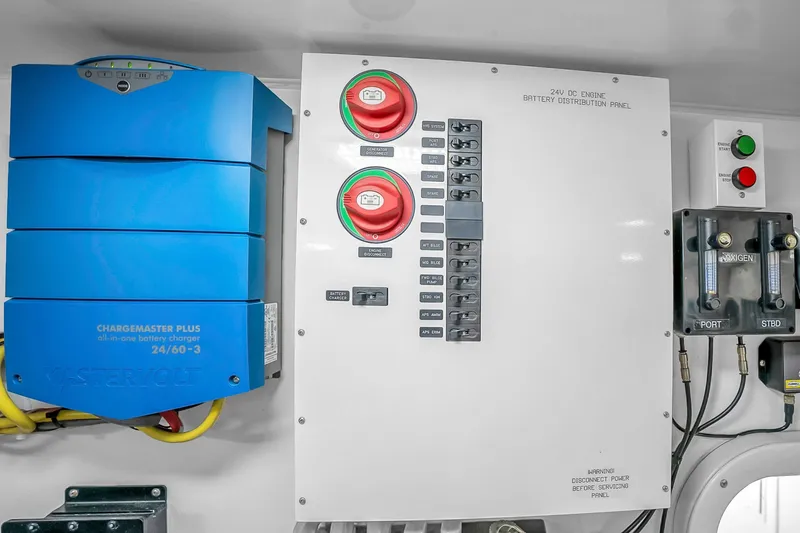 Slide: The Image of Electrical panel and battery charger in 2012 Viking 76 Convertible yacht. - 128