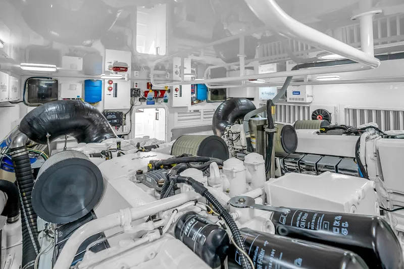 Slide: The Image of Engine room of a 2012 Viking 76 Convertible yacht, showcasing advanced machinery and components. - 130