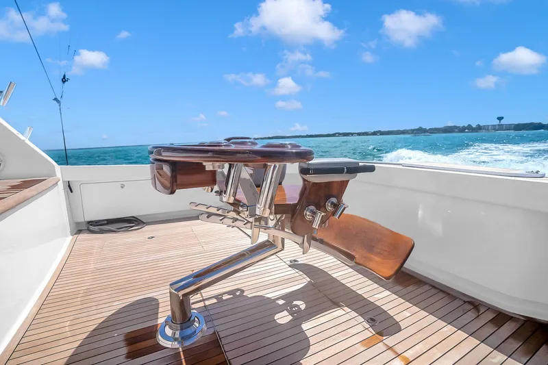 Slide: The Image of Fishing chair on 2012 Viking 76 Convertible yacht deck, ocean view. - 52