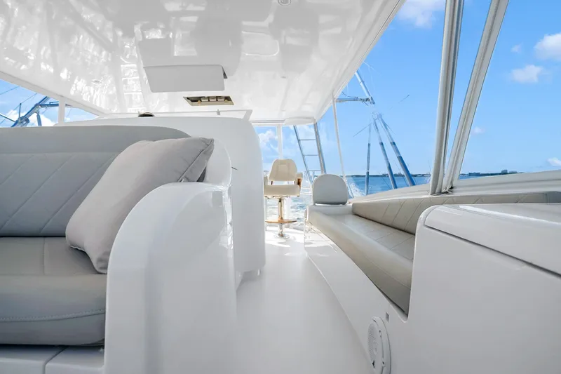 Slide: The Image of Luxurious interior of 2012 Viking 76 Convertible yacht with plush seating and ocean view. - 42