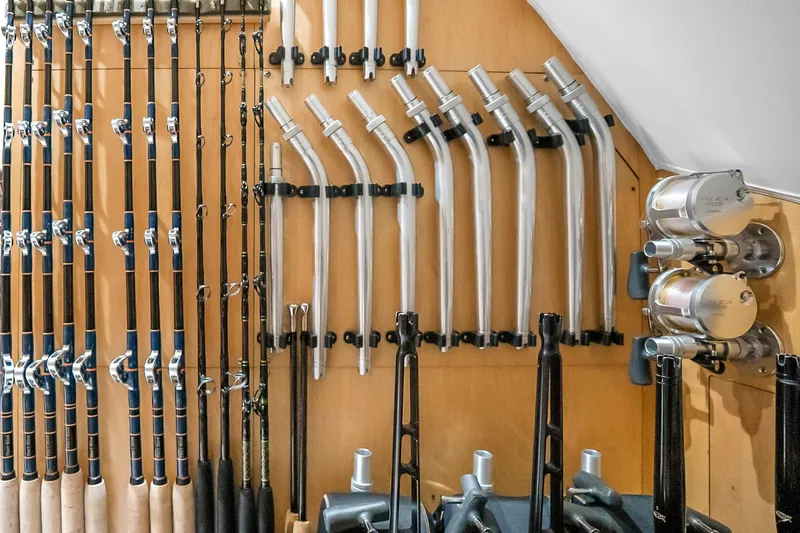 Slide: The Image of Fishing rods and equipment neatly organized on a Viking 76 Convertible yacht, 2012 model. - 77
