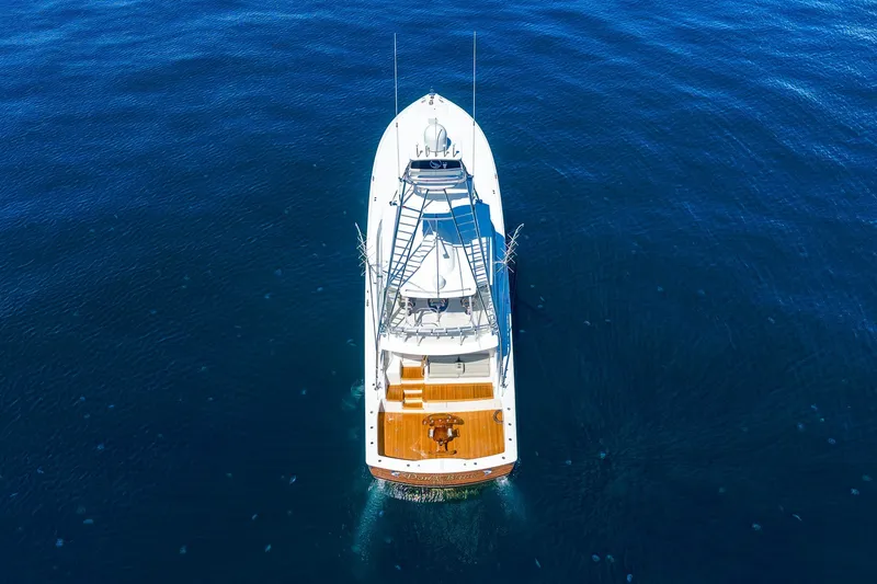 Slide: The Image of Aerial view of 2012 Viking 76 Convertible yacht on calm blue ocean. - 29