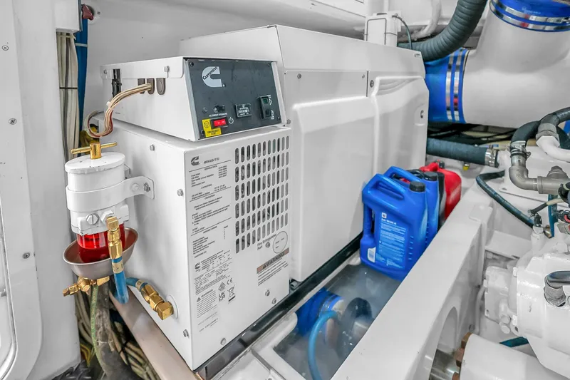Slide: The Image of Engine room of 2012 Viking 76 Convertible yacht with Cummins generator and fuel system. - 125