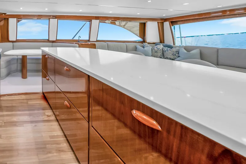 Slide: The Image of Luxurious interior of 2012 Viking 76 Convertible yacht with elegant wood finishes. - 75