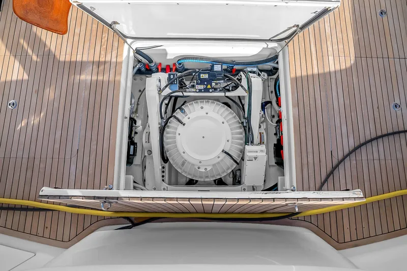 Slide: The Image of Engine compartment of 2012 Viking 76 Convertible yacht with wooden deck. - 137
