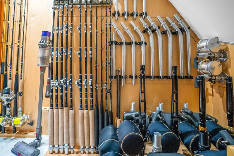 Slide: The Image of Fishing rods and equipment neatly organized on a Viking 76 Convertible yacht, 2012 model. - 78