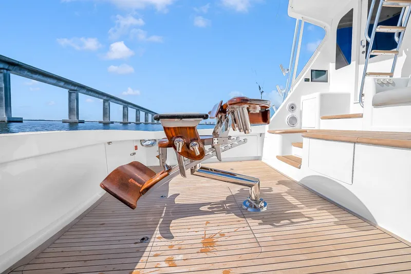 Slide: The Image of Luxury fishing chair on 2012 Viking 76 Convertible yacht deck, with ocean and bridge view. - 53