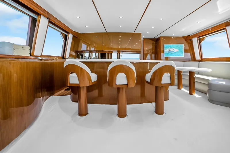 Slide: The Image of Luxurious interior of 2012 Viking 76 Convertible yacht with elegant seating and modern design. - 83