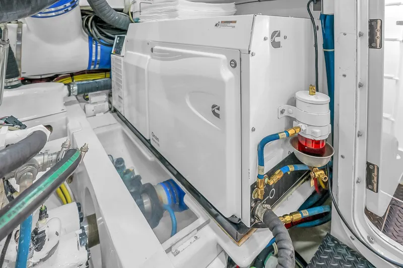 Slide: The Image of Engine room of 2012 Viking 76 Convertible yacht with Cummins generator. - 126