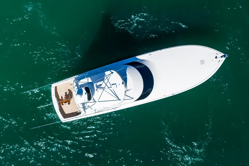 Slide: The Image of Aerial view of 2012 Viking 76 Convertible yacht on turquoise water. - 6