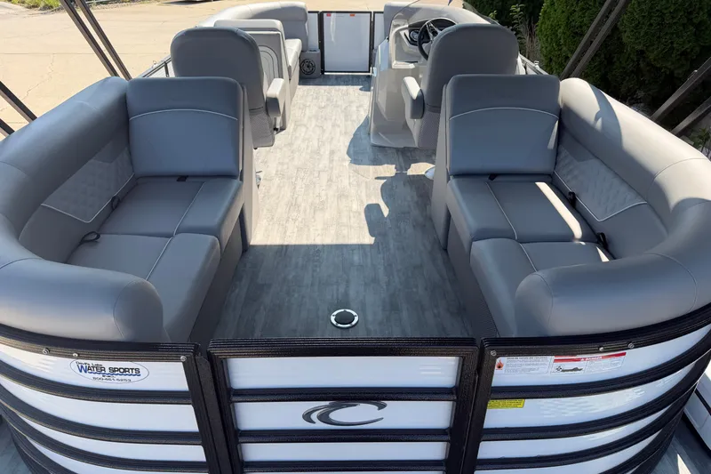 Slide: The Image of 2022 Crest Classic DLX 220 SLC pontoon boat interior with gray seating and modern design. - 15