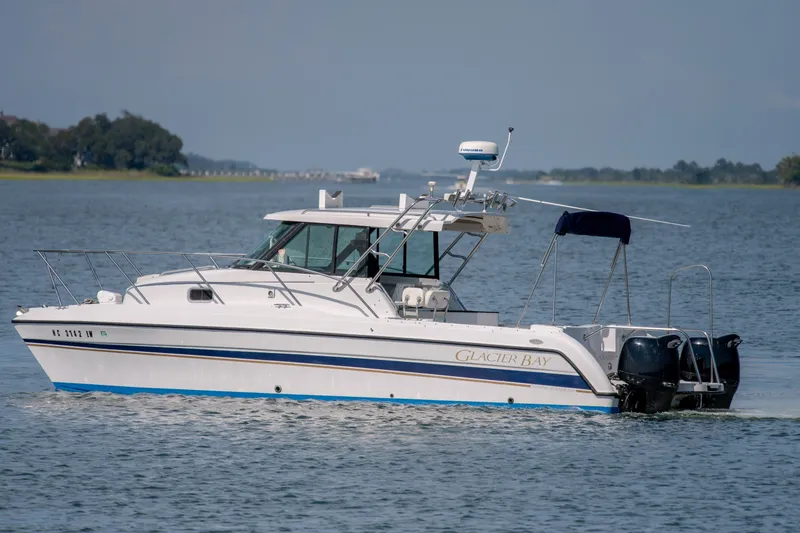 The Image of 2005 Glacier Bay 2685 Coastal Runner boat cruising on calm waters. - 0