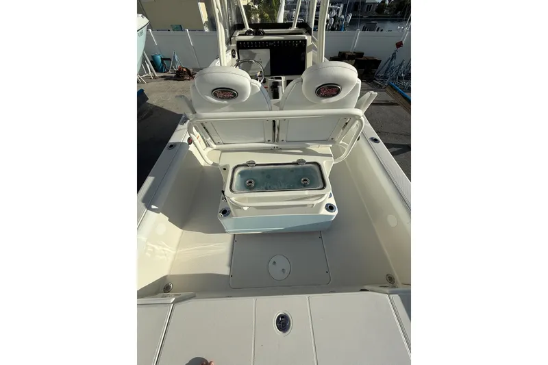 Slide: The Image of 2017 Ranger 2510 Bay Ranger boat interior with seating and storage compartments. - 9
