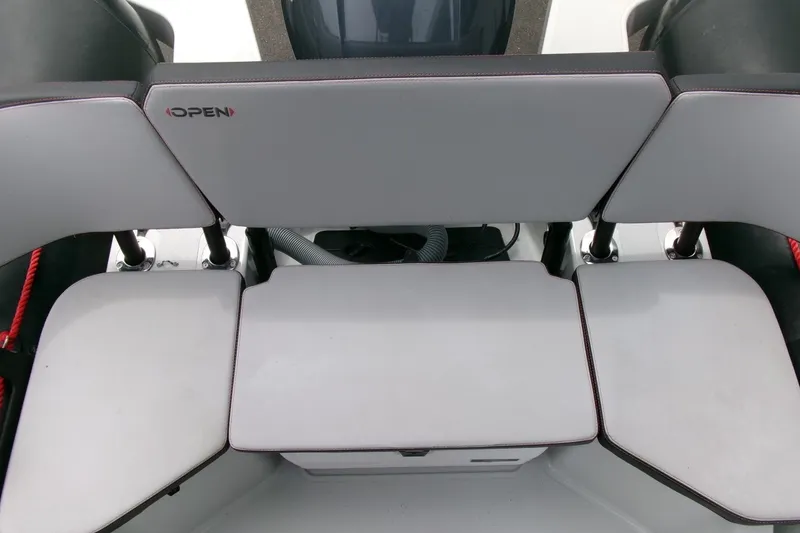 Slide: The Image of 2023 Zodiac Open 5.5 boat seating area with modern design and comfortable cushions. - 15