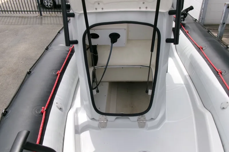 Slide: The Image of 2023 Zodiac Open 5.5 boat interior, featuring a sleek design and modern equipment. - 8