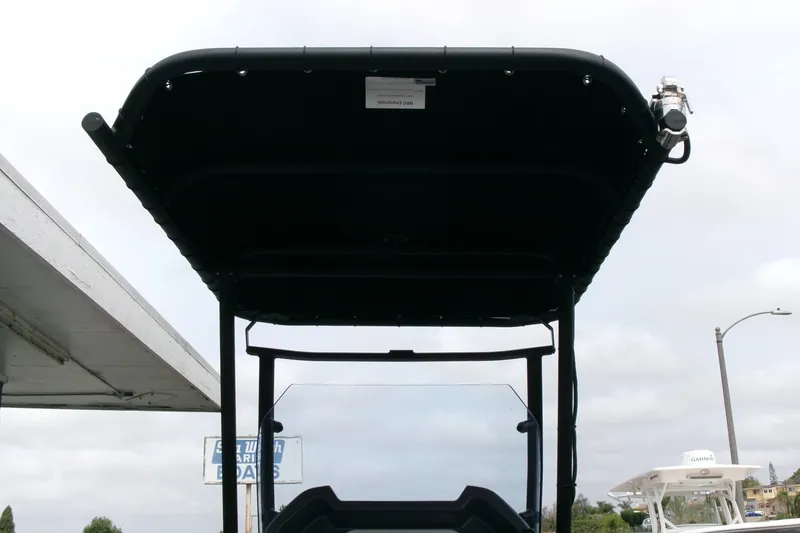 Slide: The Image of 2023 Zodiac Open 5.5 boat canopy and windshield, viewed from below. - 10
