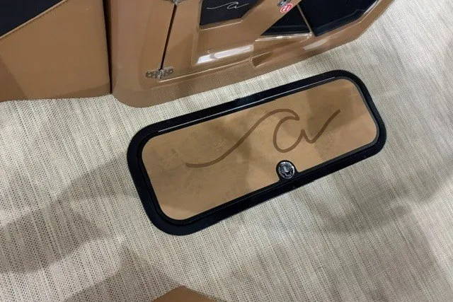 Slide: The Image of Brown Alera M23L 2027 boat interior with storage compartment and elegant design. - 18