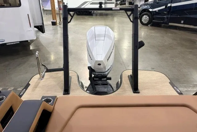 Slide: The Image of Alera M23L 2027 boat with sleek outboard motor in a showroom setting. - 15