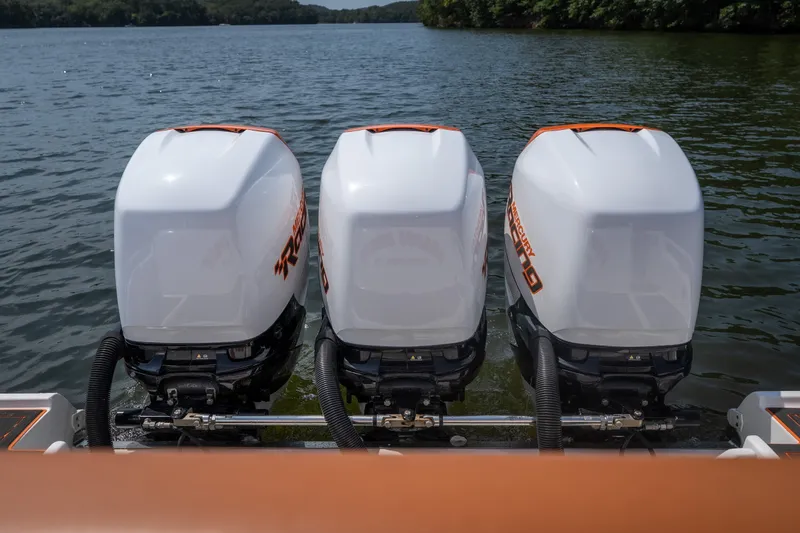 Slide: The Image of Triple Mercury Racing outboard engines on a 2007 Deep Impact 360 C boat. - 20