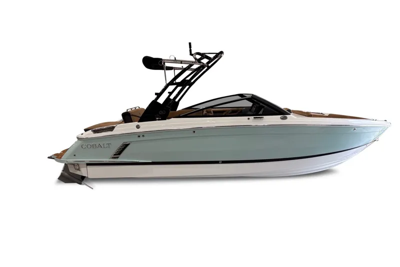 Slide: The Image of The image shows a 2026 Cobalt R4 Surf boat with a sleek, modern design. - 5