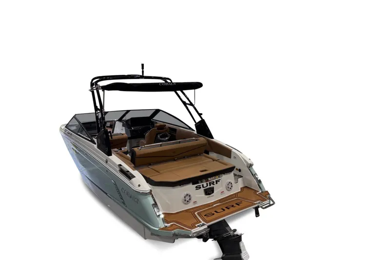 Slide: The Image of The image shows a 2026 Cobalt R4 Surf boat with sleek design and comfortable seating. - 3
