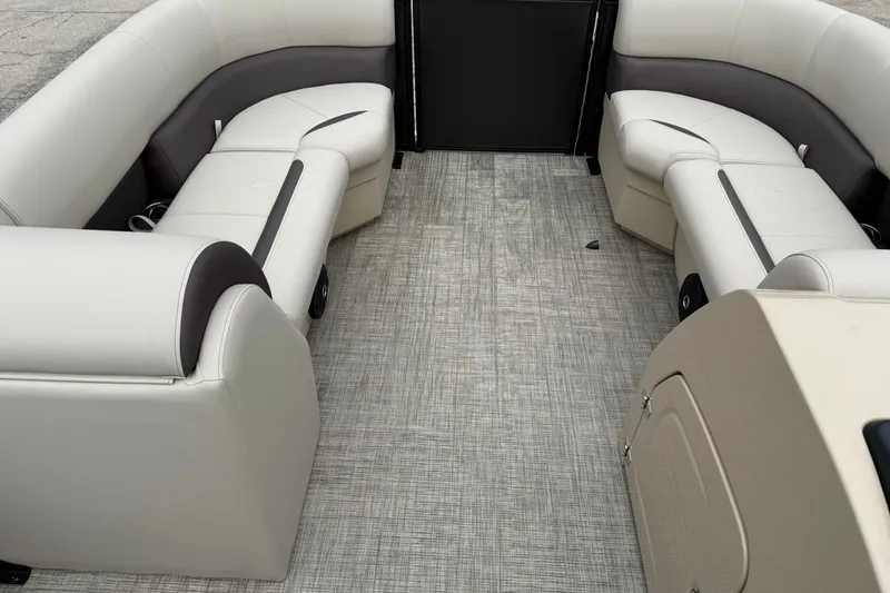 Slide: The Image of Interior of 2026 Bentley Pontoons Legacy 223 Swingback with plush seating and modern design. - 3