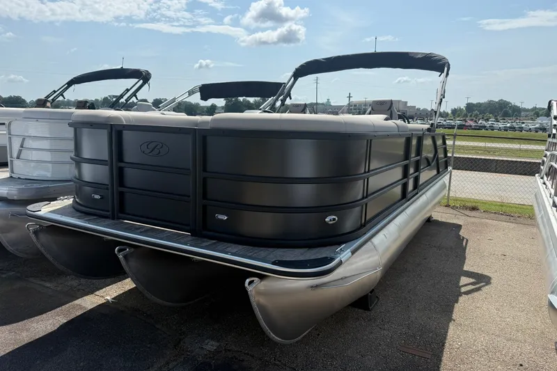 Slide: The Image of 2026 Bentley Pontoons Legacy 223 Swingback pontoon boat in a parking lot. - 1