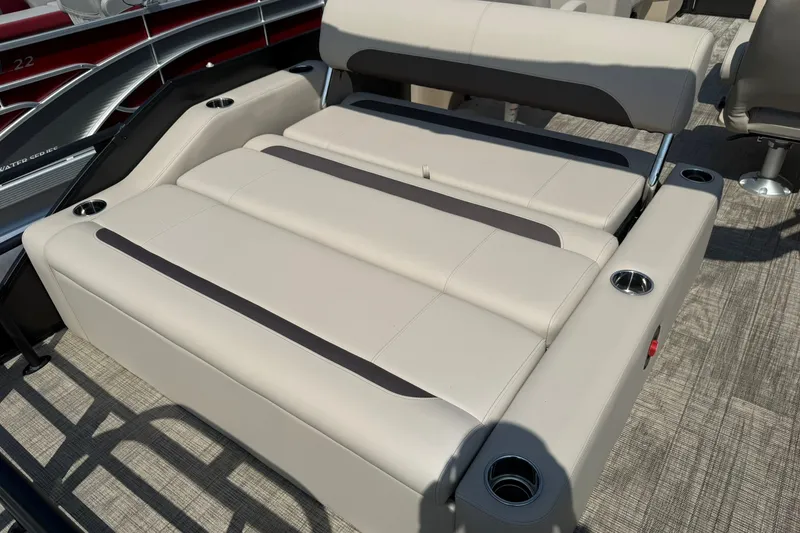 Slide: The Image of 2026 Bentley Pontoons Legacy 223 Swingback with luxurious seating and cup holders. - 13