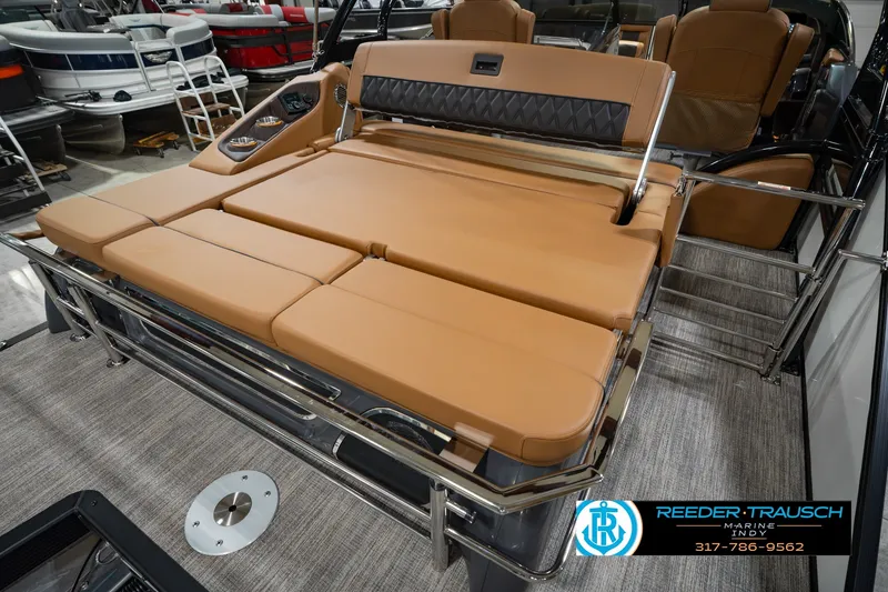 Slide: The Image of 2027 Bennington 23 RSWBA boat interior with tan seating and sleek design. - 34