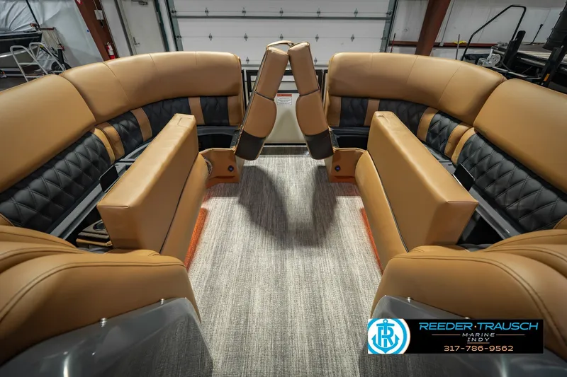 Slide: The Image of Luxurious interior of 2027 Bennington 23 RSWBA pontoon boat with tan and black seating. - 26