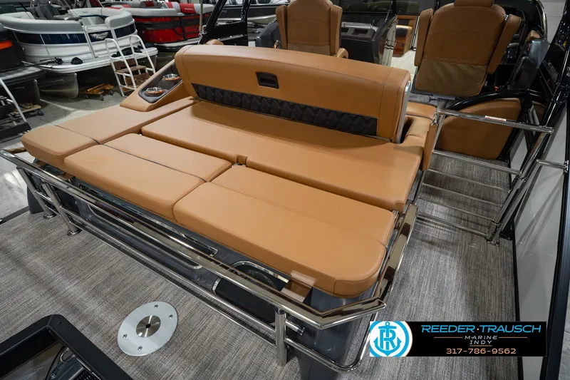 Slide: The Image of 2027 Bennington 23 RSWBA boat interior with tan seating and sleek design. - 33