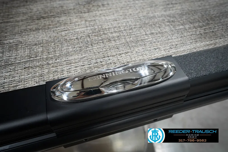 Slide: The Image of Close-up of 2027 Bennington 23 RSWBA boat detail with Reeder-Trausch Marine logo. - 60