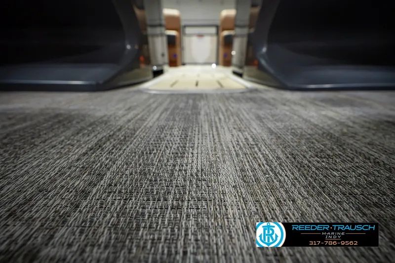 Slide: The Image of Carpeted interior of 2027 Bennington 23 RSWBA boat, showcasing modern design. - 53