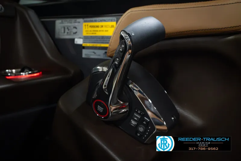 Slide: The Image of Throttle control of 2027 Bennington 23 RSWBA boat, featuring sleek design and ergonomic handle. - 44